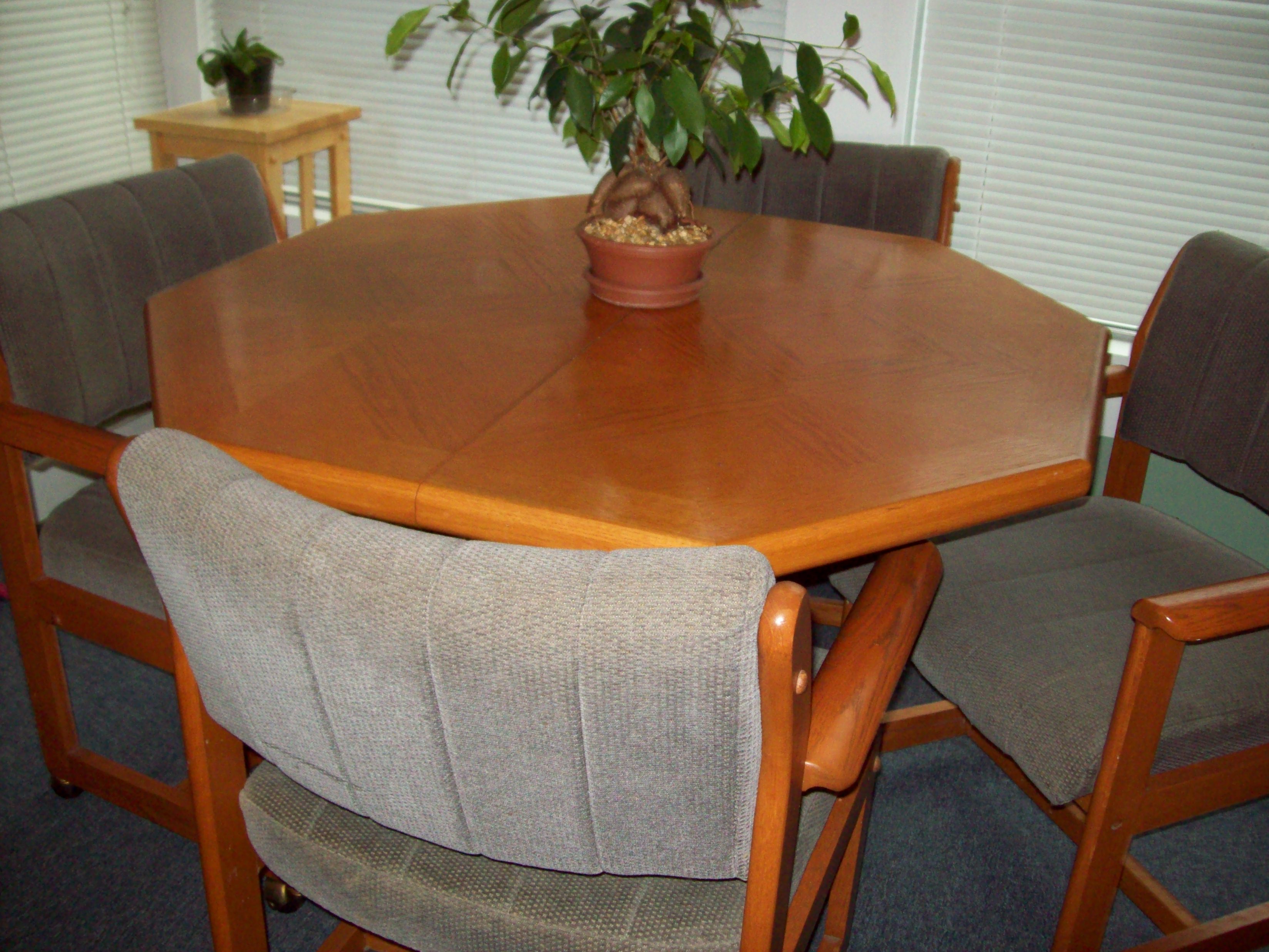 Dining room table, with leaf, 8 chairs. See my ad in Buy/Sell. emreid930@yahoo.com